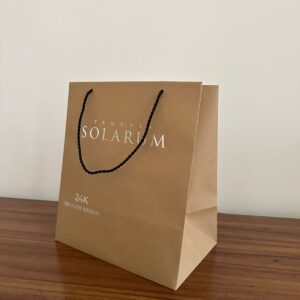 Bolsas de papel de lujo con asas elegantes para regalos y boutiques exclusivas